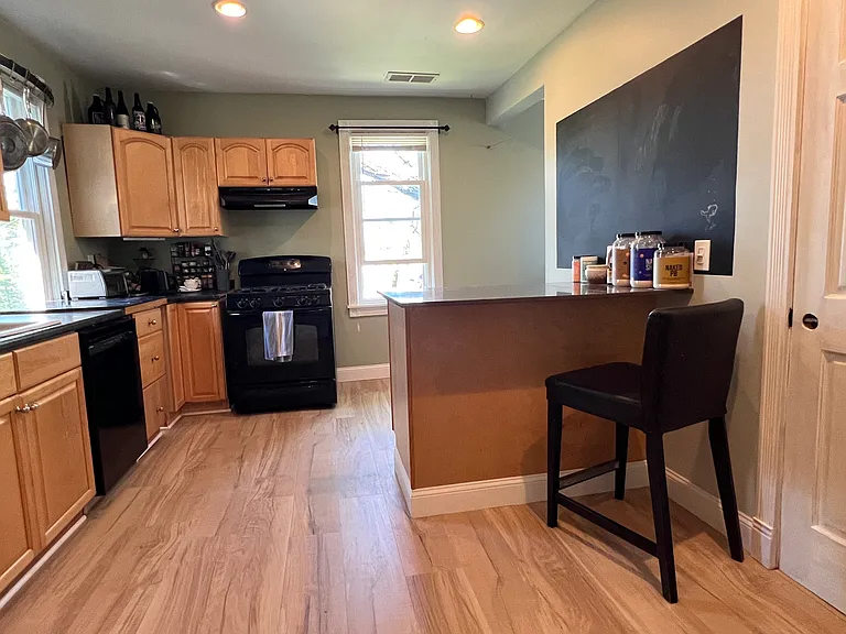 Spacious kitchen with new Bosch dishwasher and center island