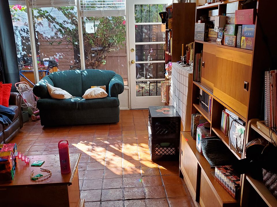 Living room with large picture windows .