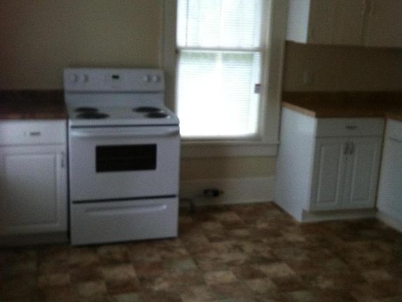 large eat-in kitchen with updated cabinets