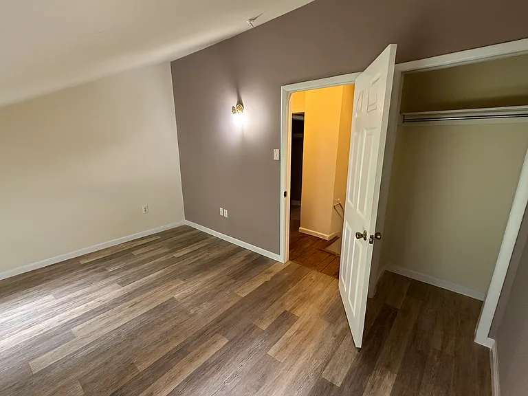 3rd Floor Back Bedroom. ** This photo was altered with similar flooring that is being installed