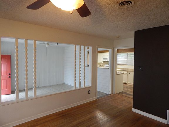Living room towards entry and Kitchen.