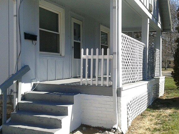 Covered front porch area and front door entrance