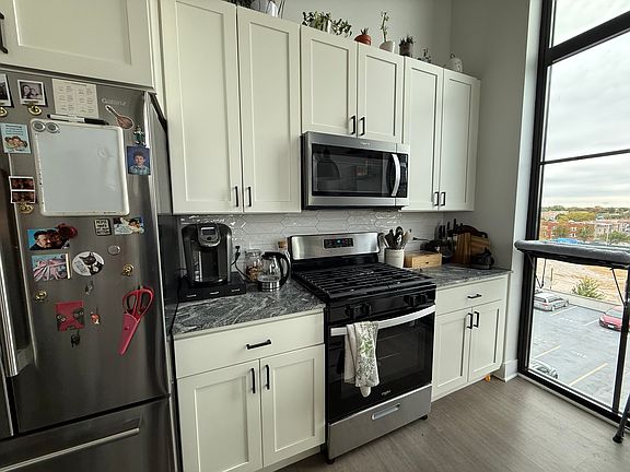 Granite Countertops and Black Trim Designer Fixtures
