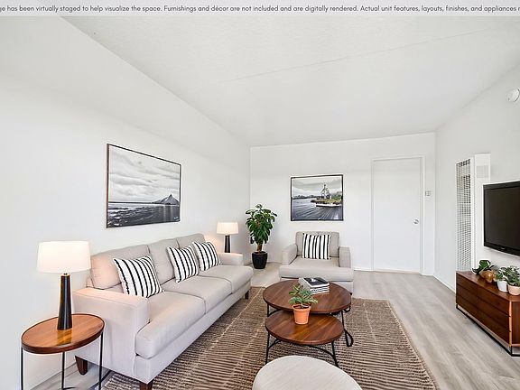 Large living space featuring a comfortable layout and plenty of natural light.