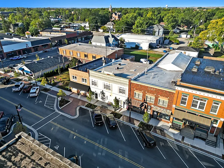 Located in downtown Peotone at 112 N. Second, this unit is rear unit of the green/grey building in the picture.