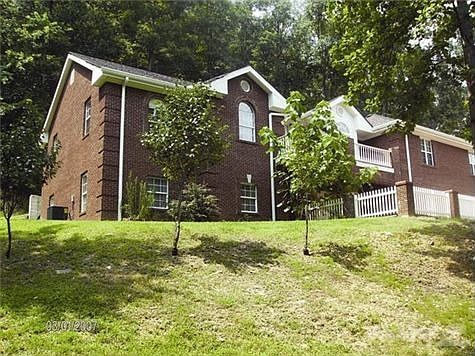 Live high on a hill! Excellent workmanship, natural woodwork, extra wide crown molding and beautiful