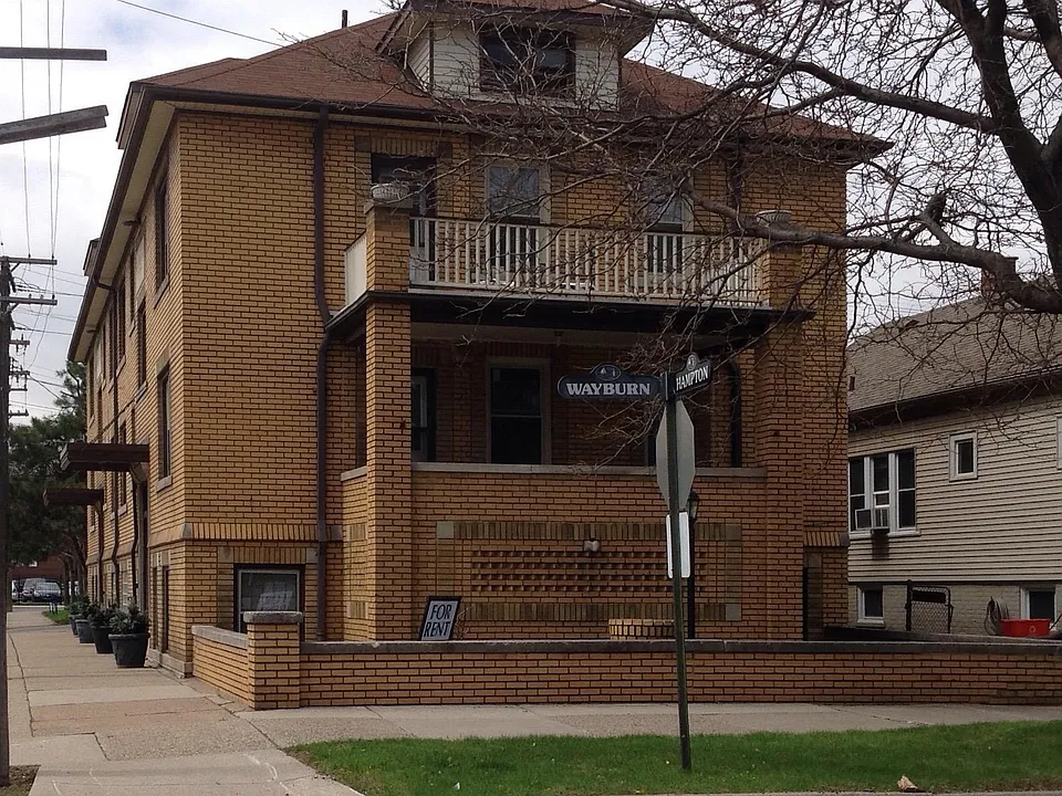 Loft like garden style apartment located at the corner of Hampton and Wayburn in Grosse Pointe Park.