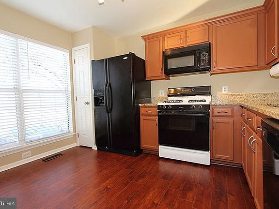 Kitchen with table space and granite counters