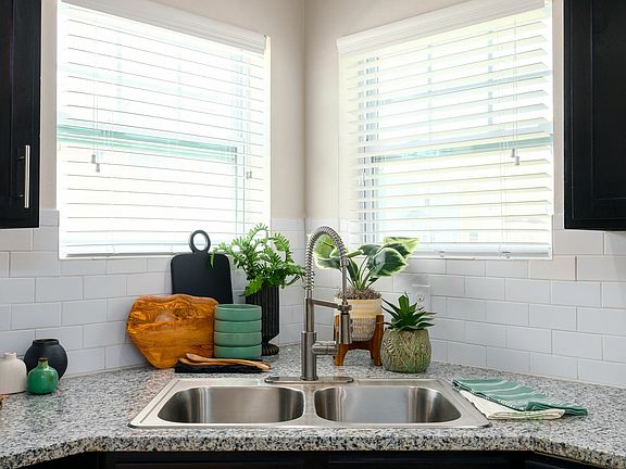 Enjoy a Stylish Kitchen with Granite Countertops at Seaglass Apartments - Elevate Your Corpus Christi Living