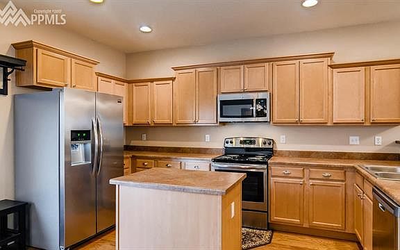 Kitchen with all stainless steel appliances