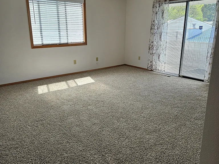 master bedroom upstairs with sliding door to patio on suite bathroom & 2 walk in closets