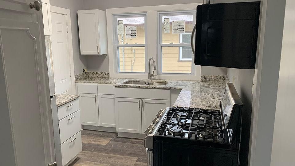 Kitchen leading to rear entry