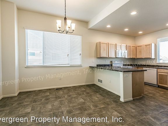 4th image of 719 Mount Evans Ave