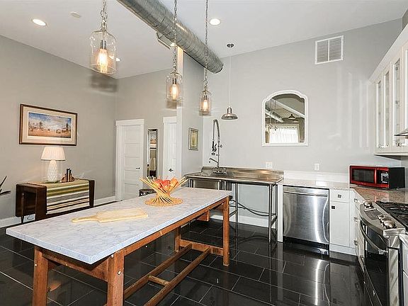 Gourmet Kitchen with Stainless Steel Appliances, Dishwasher, Gas Range, and Granite Countertops