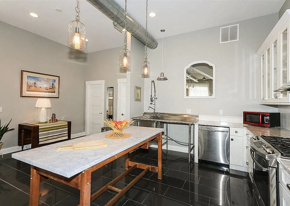 Gourmet Kitchen with Stainless Steel Appliances, Dishwasher, Gas Range, and Granite Countertops