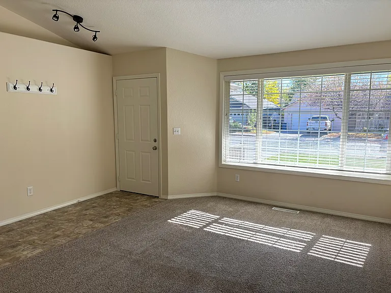 Living room and entry has south facing window with lots of light.