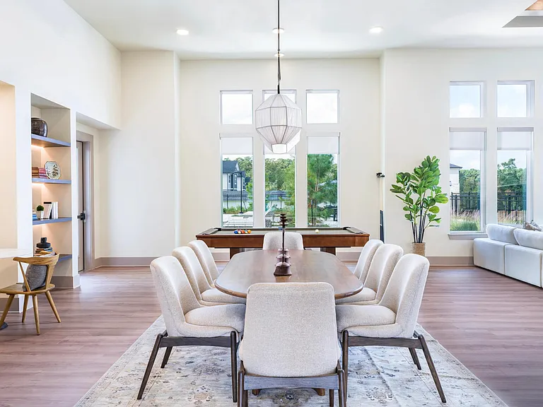 Unwind in style at Beckett West Fork's clubroom, featuring cozy lounge seating, billiards, and spaces perfect for gathering.