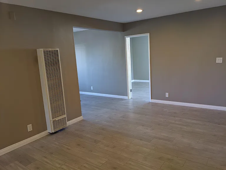 Living room looking into dining room/kitchen.