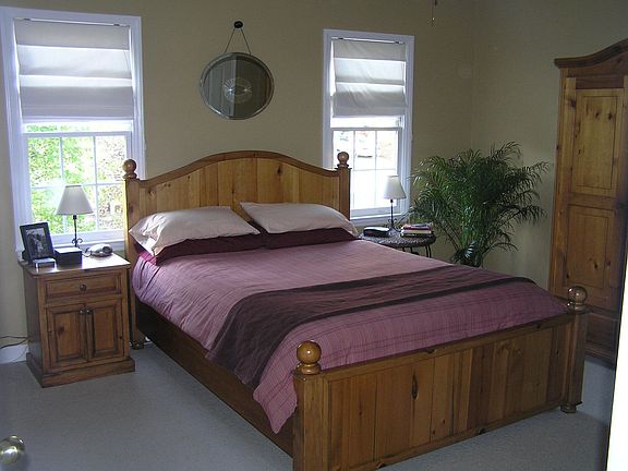 Master bedroom with vaulted ceiling