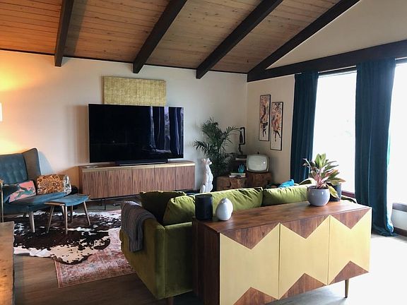 upstairs living room with different furniture