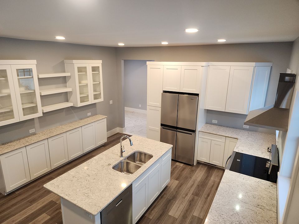 Incredible kitchen with granite countertops and ample storage space for all of your kitchen supplies
