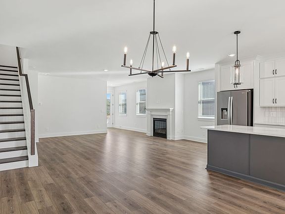 The open-concept floorplan allows for an easy flow between the kitchen and dining areas.