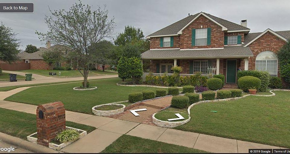 Corner lot with side garage entrance.