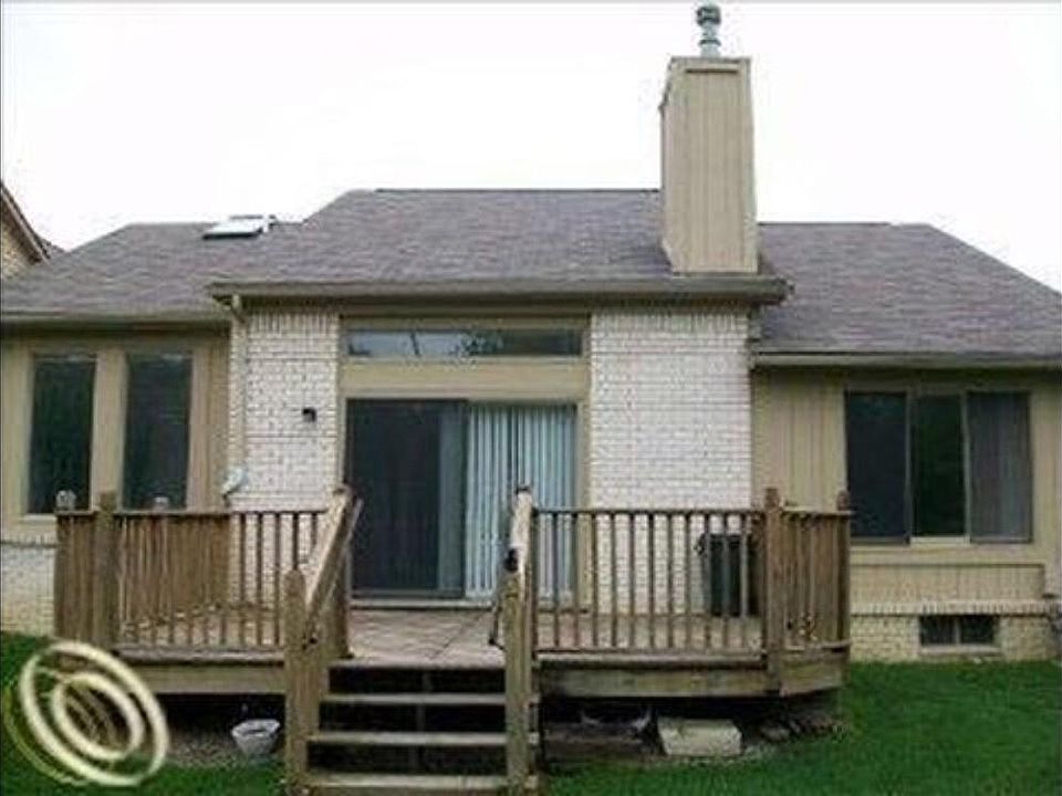 1 OF 2 LARGE DECKS THAT FACE PRIVATE WOODED AREA