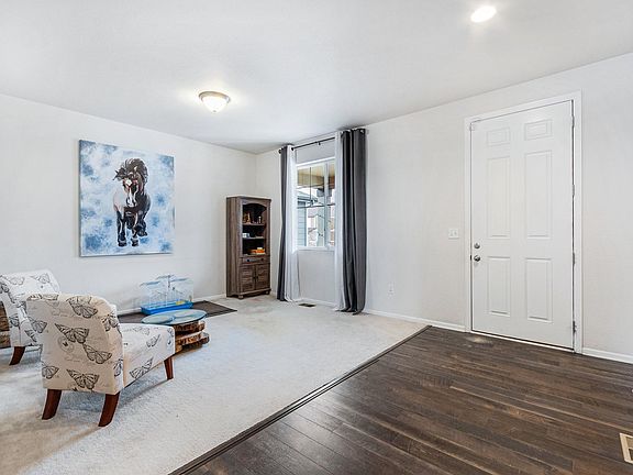 Living room is 12'10' by 11'6"