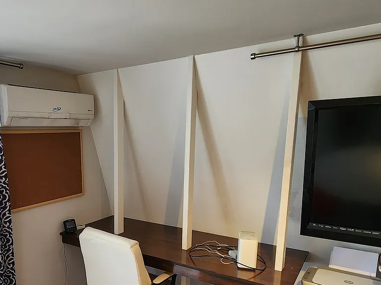 work desk area, with chair, wall pinboard and small printer. You can see the new mini-split heat/AC on the wall. It heats and cools really quickly and is very very quiet.