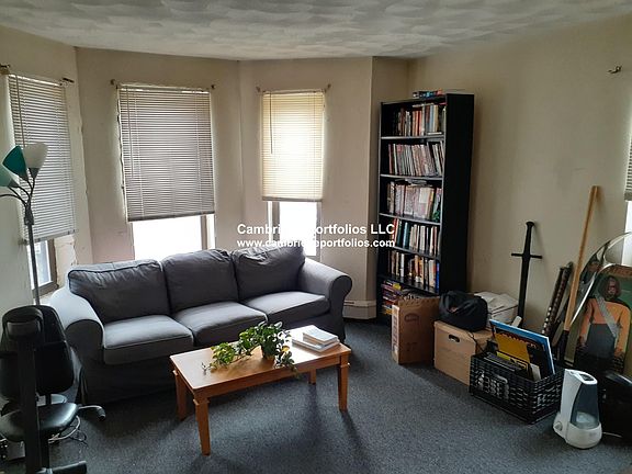 Living Room (current condition with Carpet, will have Hardwood Floors Installed) (will be newly painted)