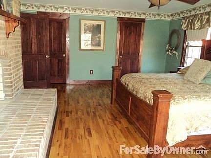 Master
						:
						View from one corner of master view of walk in closet/bath-3 windows-well lit