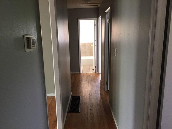Hallway access to bedrooms and bath