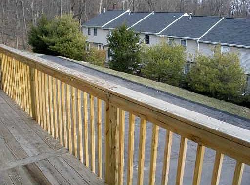 A deck off the back sits over the two car garage.