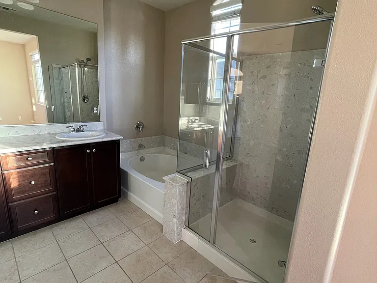 Master bath - Large bathtub and a Standing Shower with double sinks