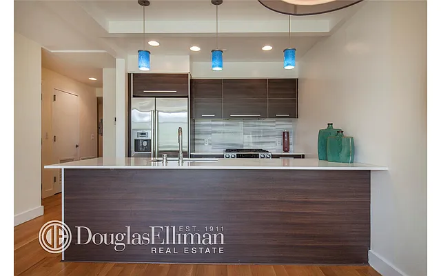 Sold by Douglas Elliman | media 13