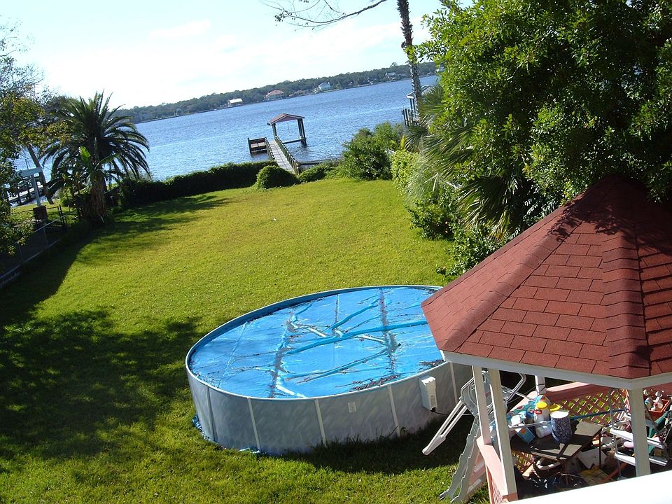 LOOKING OFF THE TOP DECK PORCH