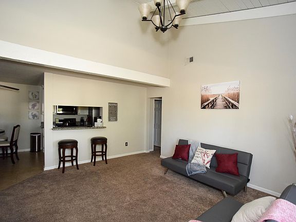 Roomy living space with vaulted ceiling.