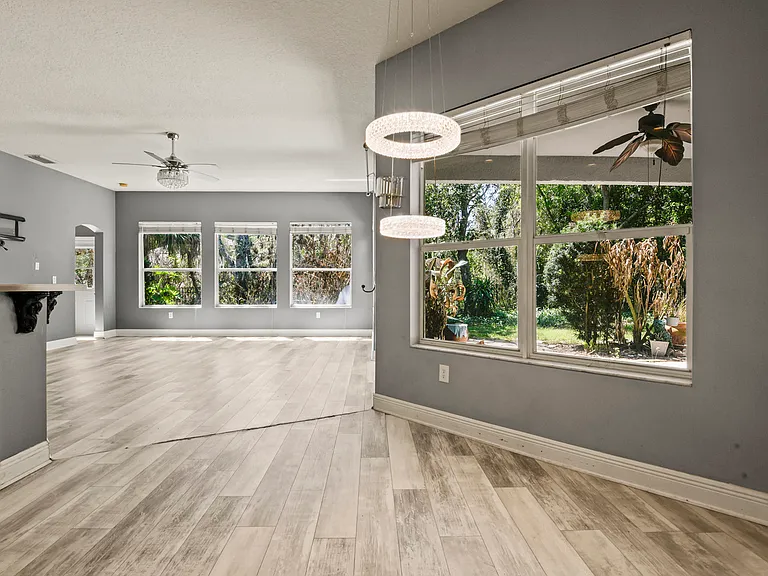 breakfast area / 2nd living area with views of lanai and back yard