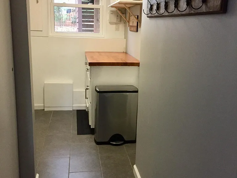 Laundry room off garage entry. HVAC located here.