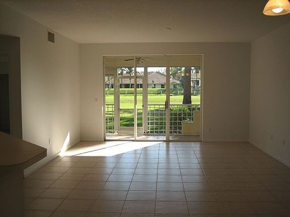 Living Room overlooking patio and 14th fairway