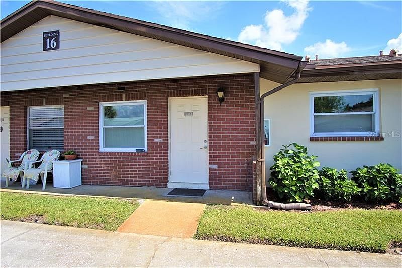 Front entry. All windows have been upgraded to impact resistant and energy efficient