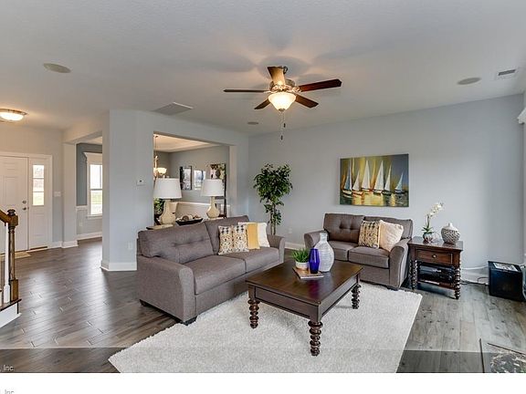 Great Room looking towards Dining Room and Foyer.  Photo shown similar to home being built
