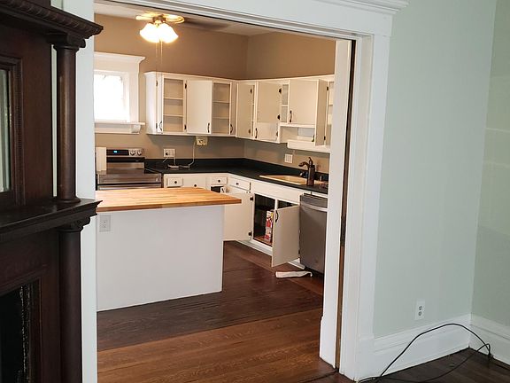 Living room into kitchen- lots of cabinet space!