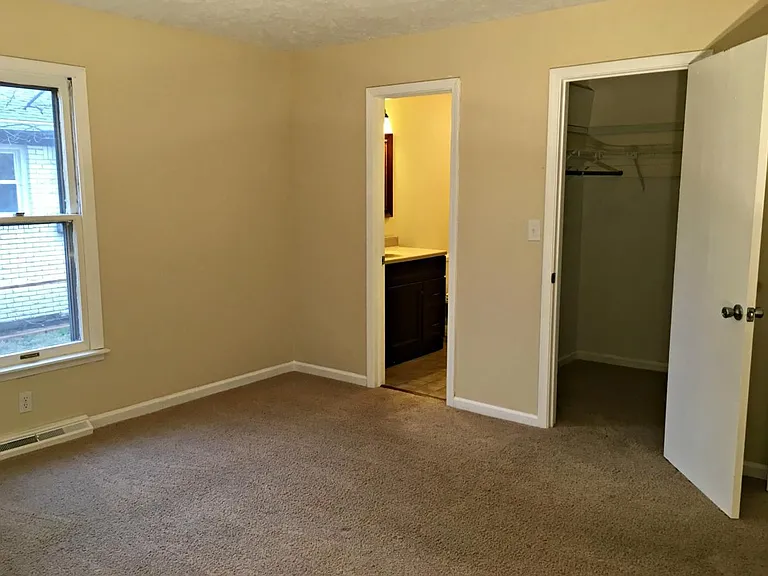 Master bedroom with walk-in closet