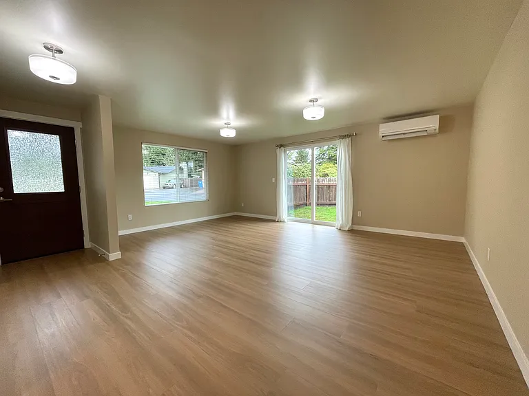 Light and bright great room with ductless heat pump.