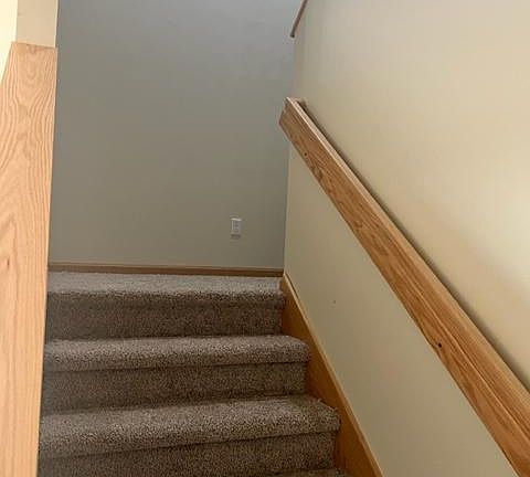 wide staircase leading to the 2nd story