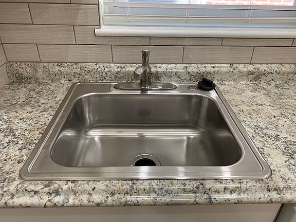 Kitchen SS Sink with Ceramic Tile Backsplash and Countertop