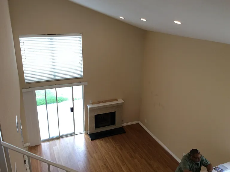 Upstairs view down into the family room.