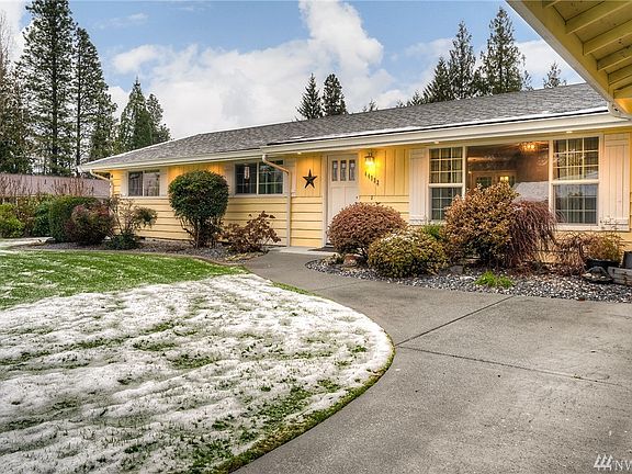 Tidy concrete curbing makes the mature landscaping pop! Clean and crisp through and through. 